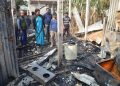 বিজেপি কর্মীর বাড়িতে আগুন